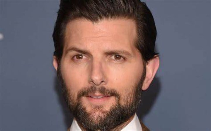 Adam Scott as his mystery unnamed paramedic character in Madame Web.